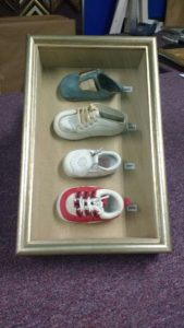 Shadow Box of Baby Shoes